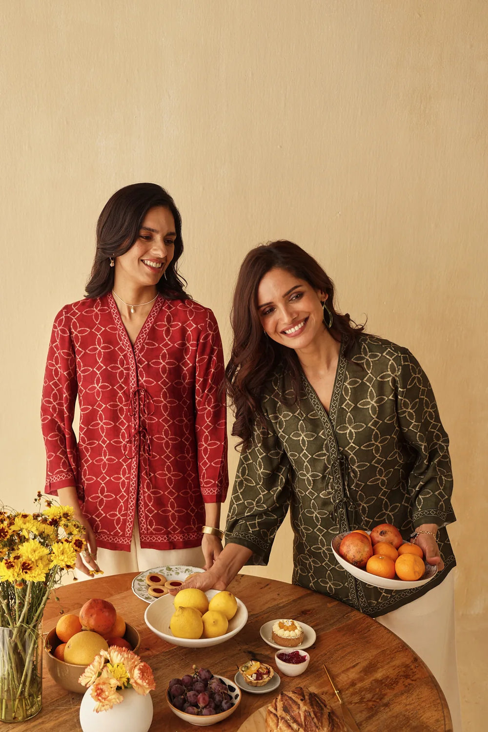 Two women in the Everyday Ease Top in red and olive green